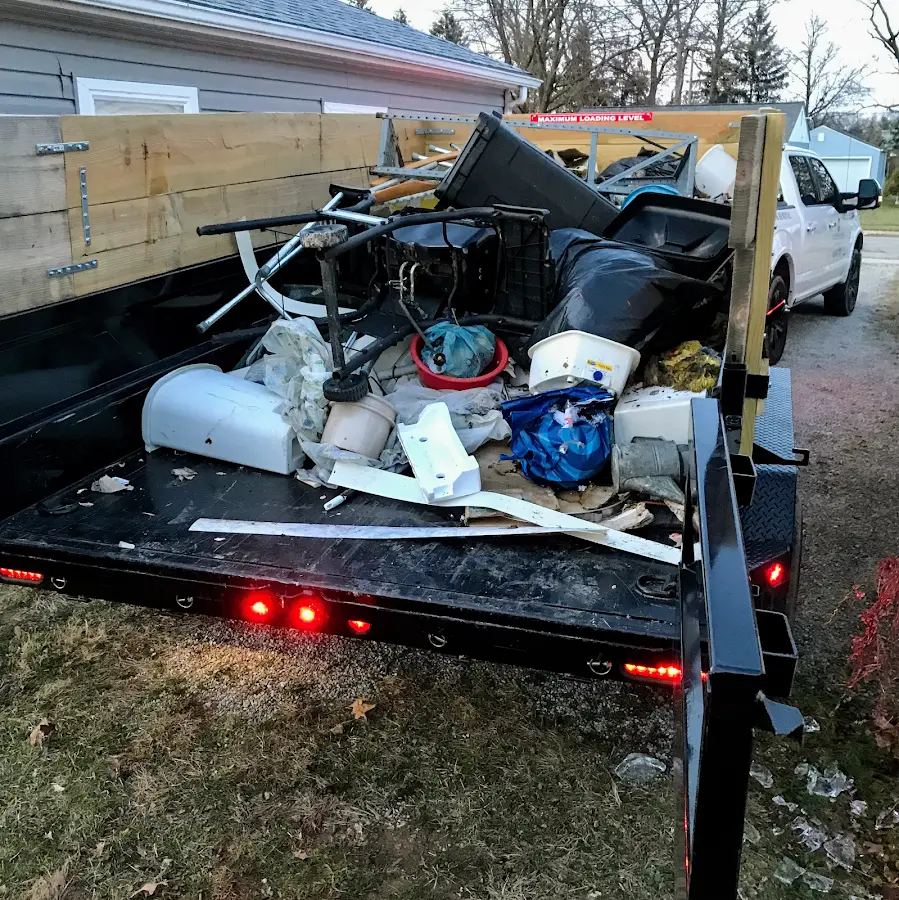 Roll-off dumpster delivered to a residential driveway in DeSoto